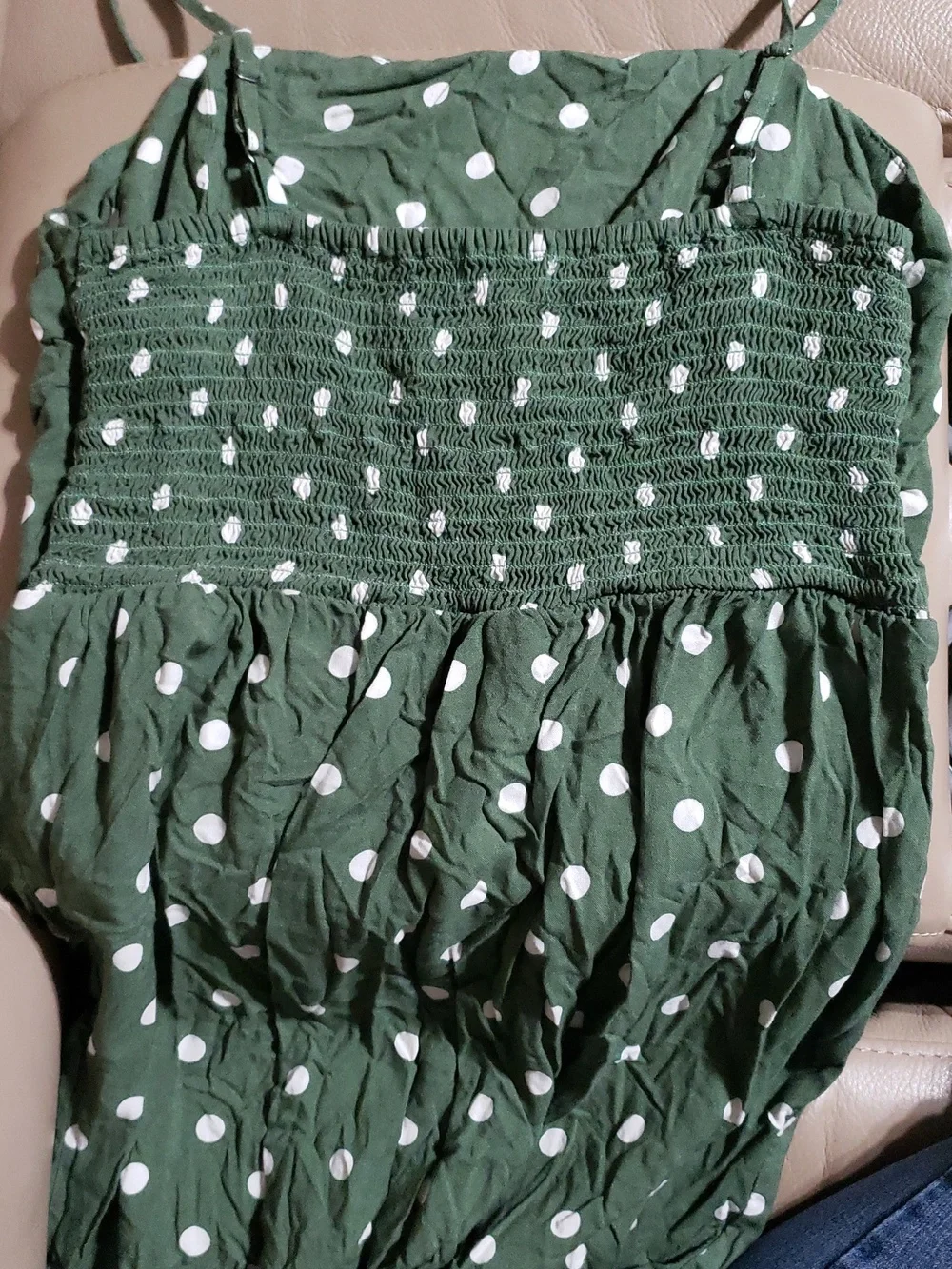 Aéropostale polka dot sundress featuring a ruched design and adjustable straps.